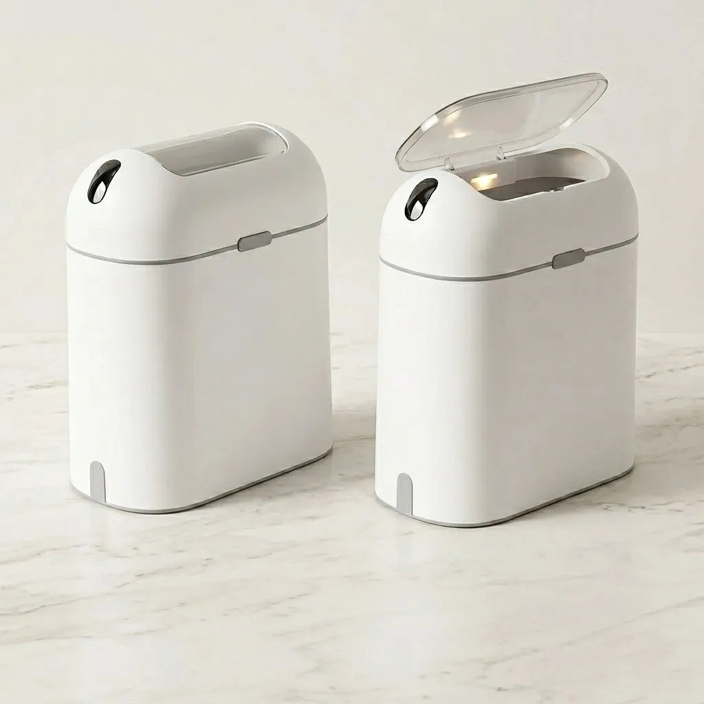 Stainless steel touchless trash can with motion sensor lid open in a modern kitchen setting