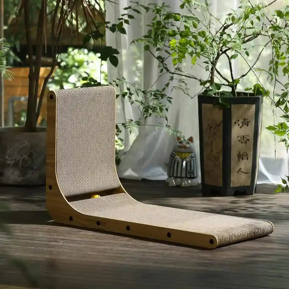 L-shape cat scratcher standing in a room beside houseplants