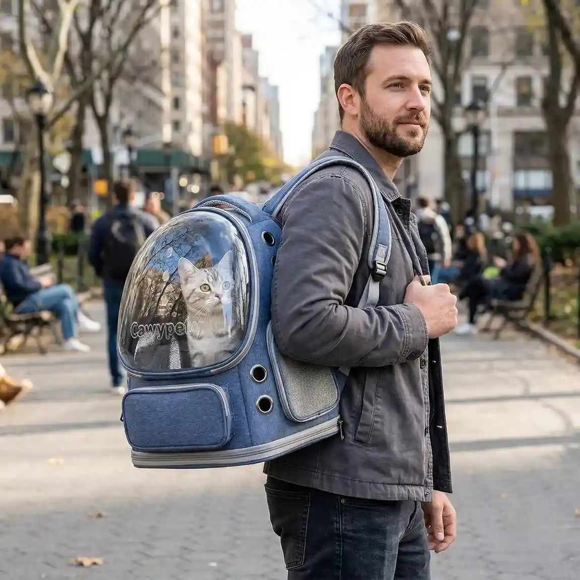 Side view of a Bubble Pet Backpack showing the transparent polycarbonate window and side ventilation holes.
