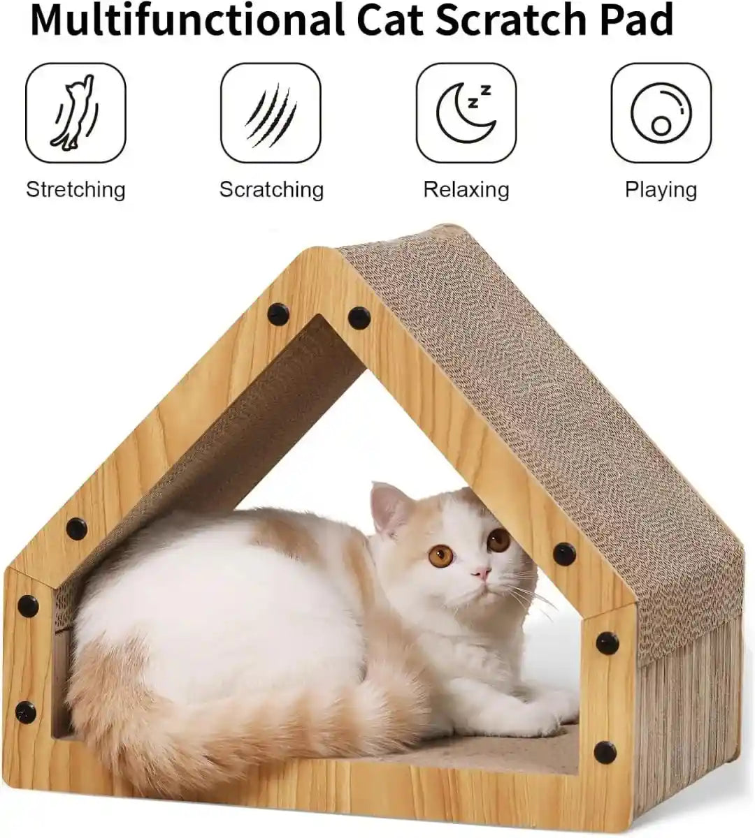 White cat resting inside the cardboard cat scratcher house