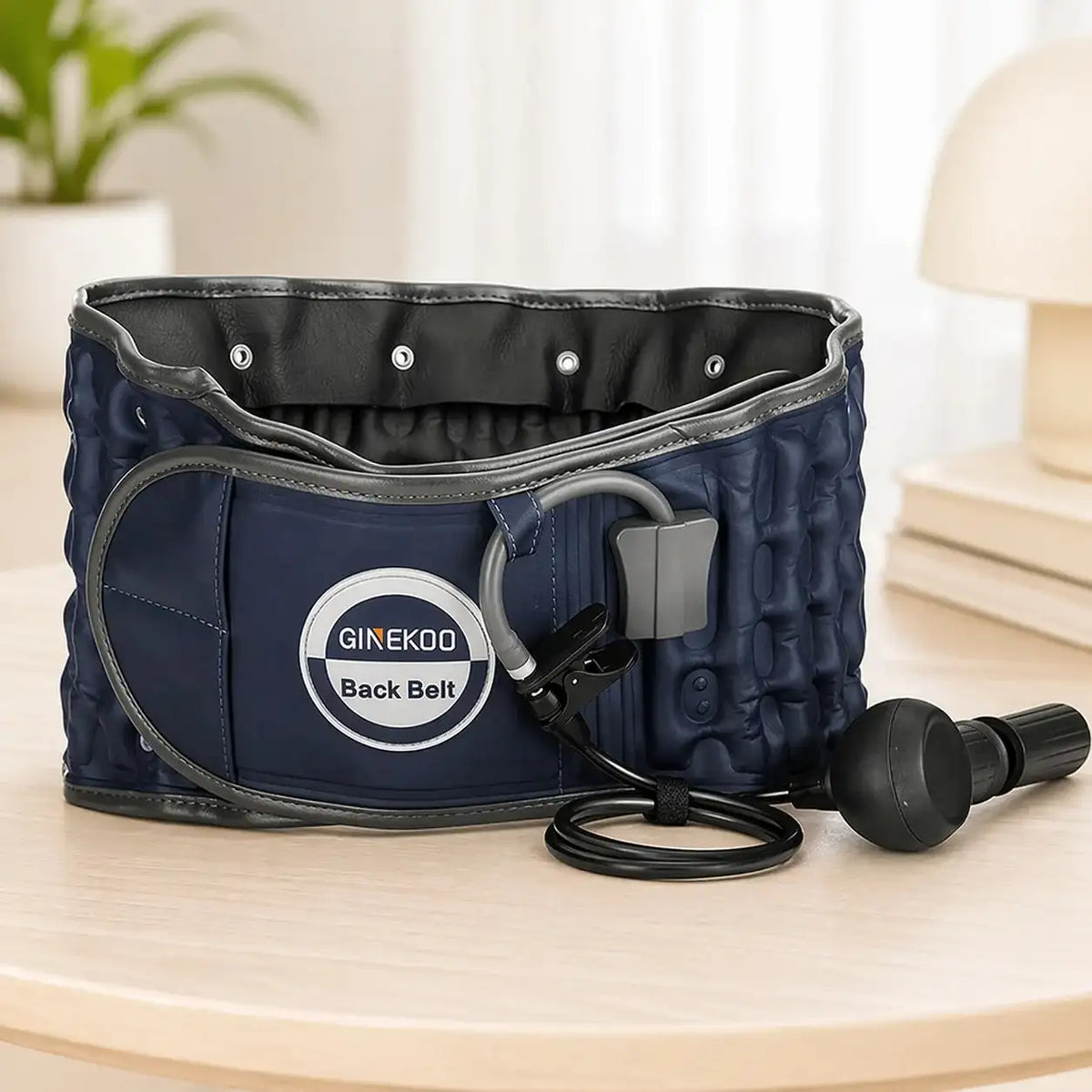 Person wearing an inflatable Ginekoo lumbar decompression support belt for back pain relief.