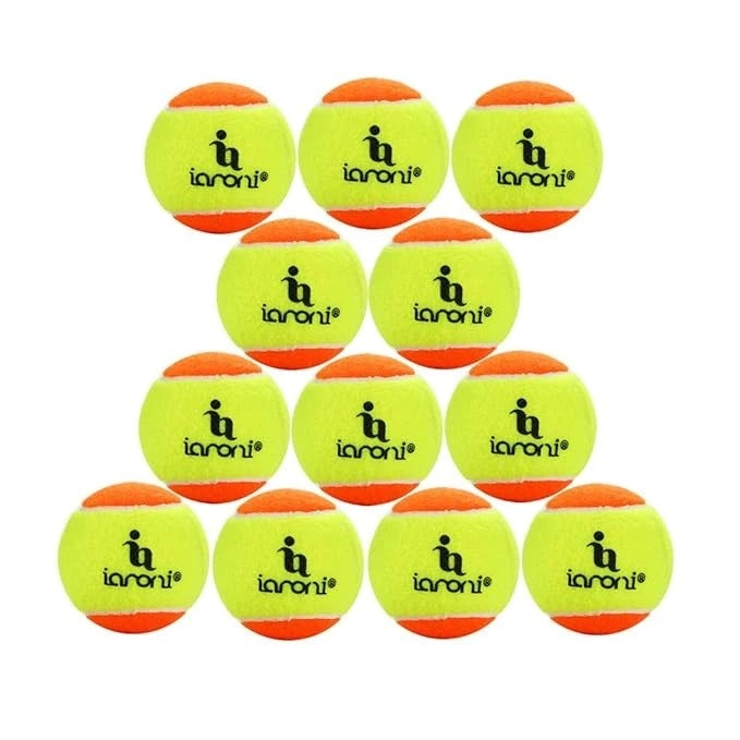 Twelve yellow and orange pickleball balls stacked in a pyramid